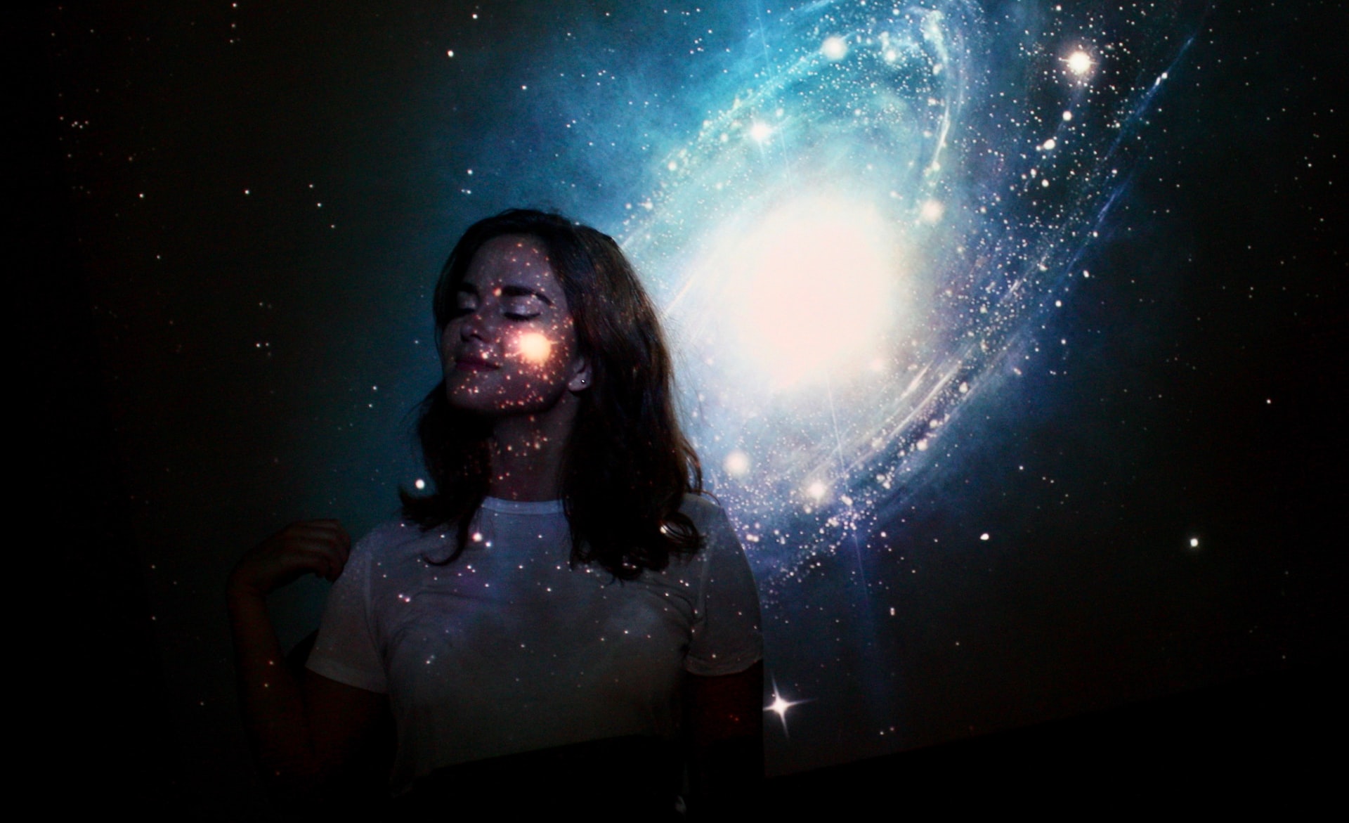 Woman standing in the stars.