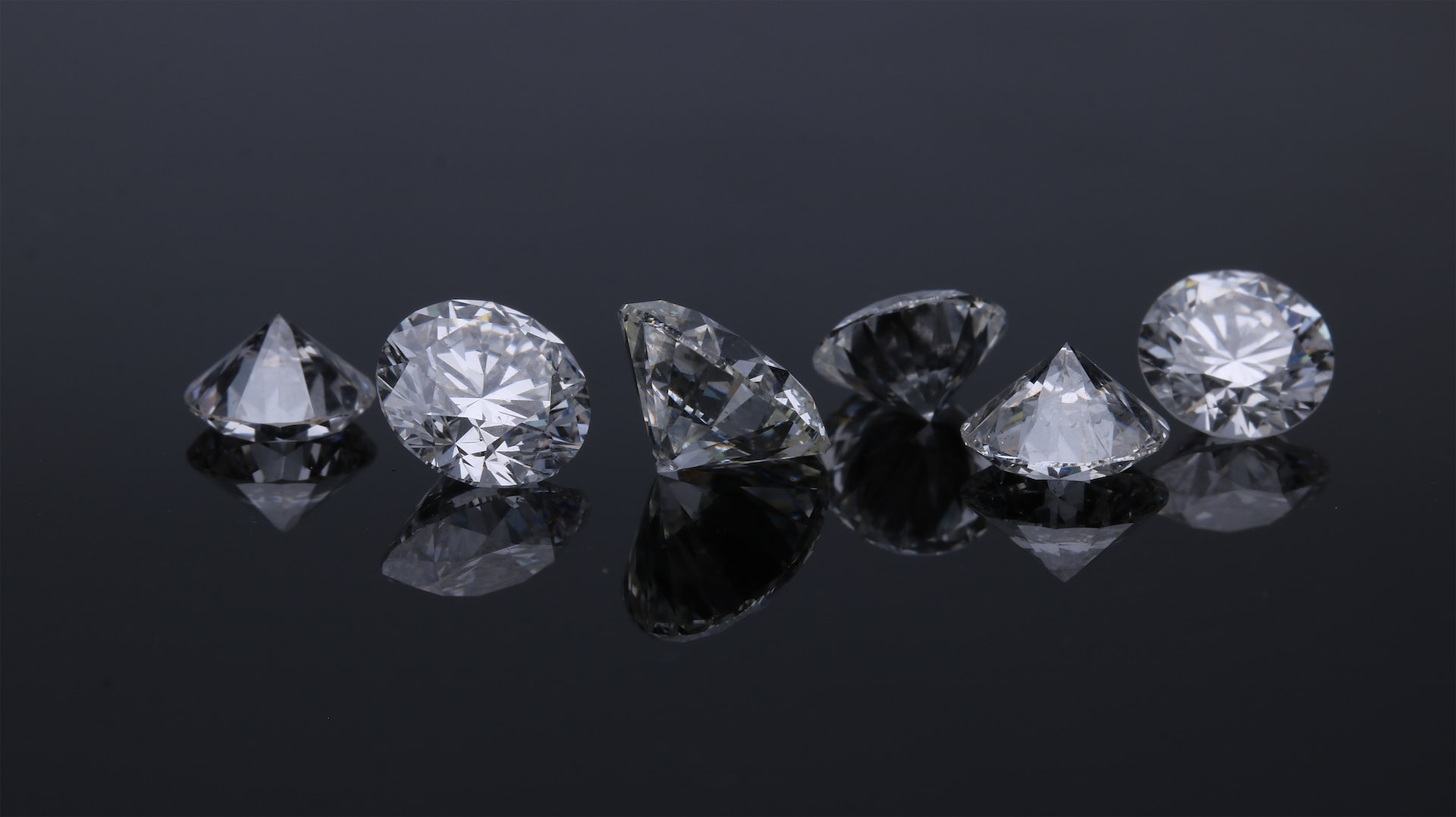 Diamonds on a dark background.